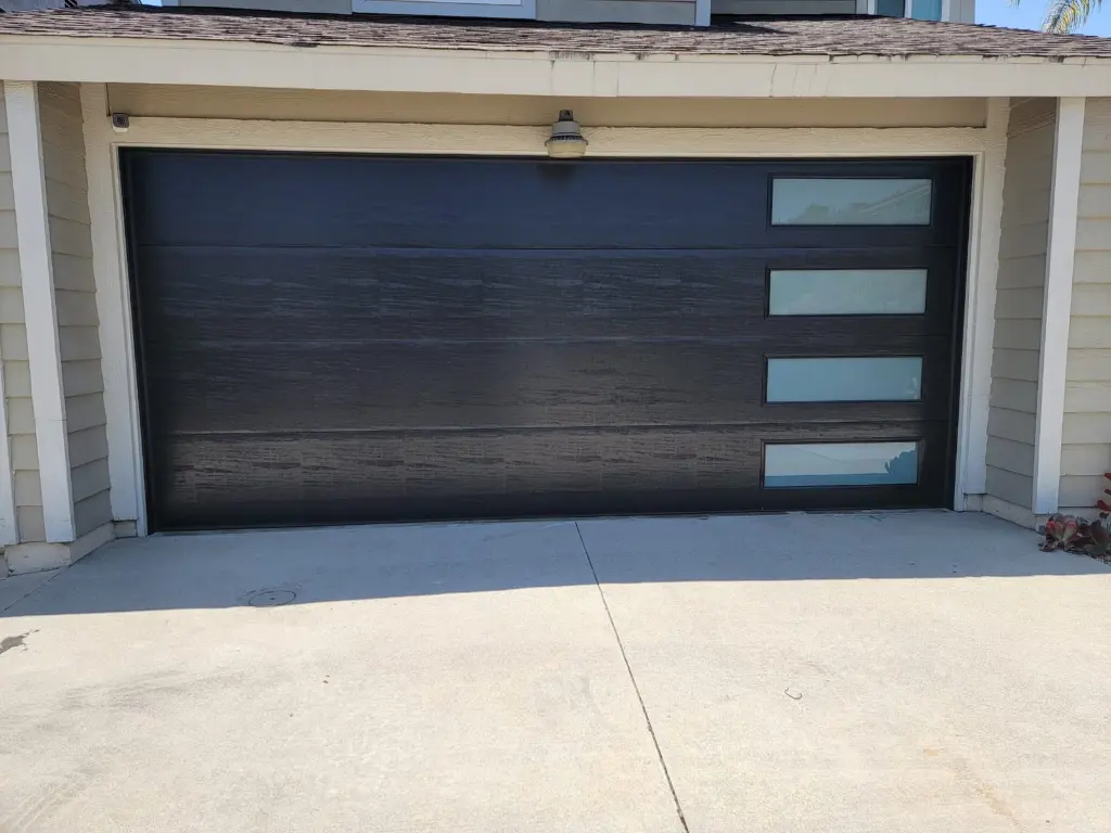 Charcoal insulated garage door installed by AER Garage Door Repair