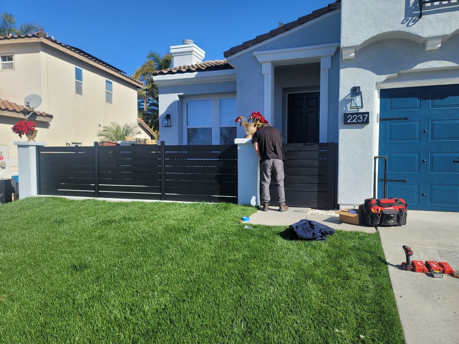 AER installer working on a fence