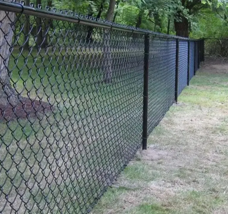 Long run of black chain link fence installed by AER