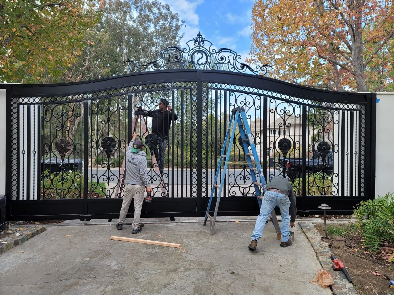 AER crew installing a driveway gate