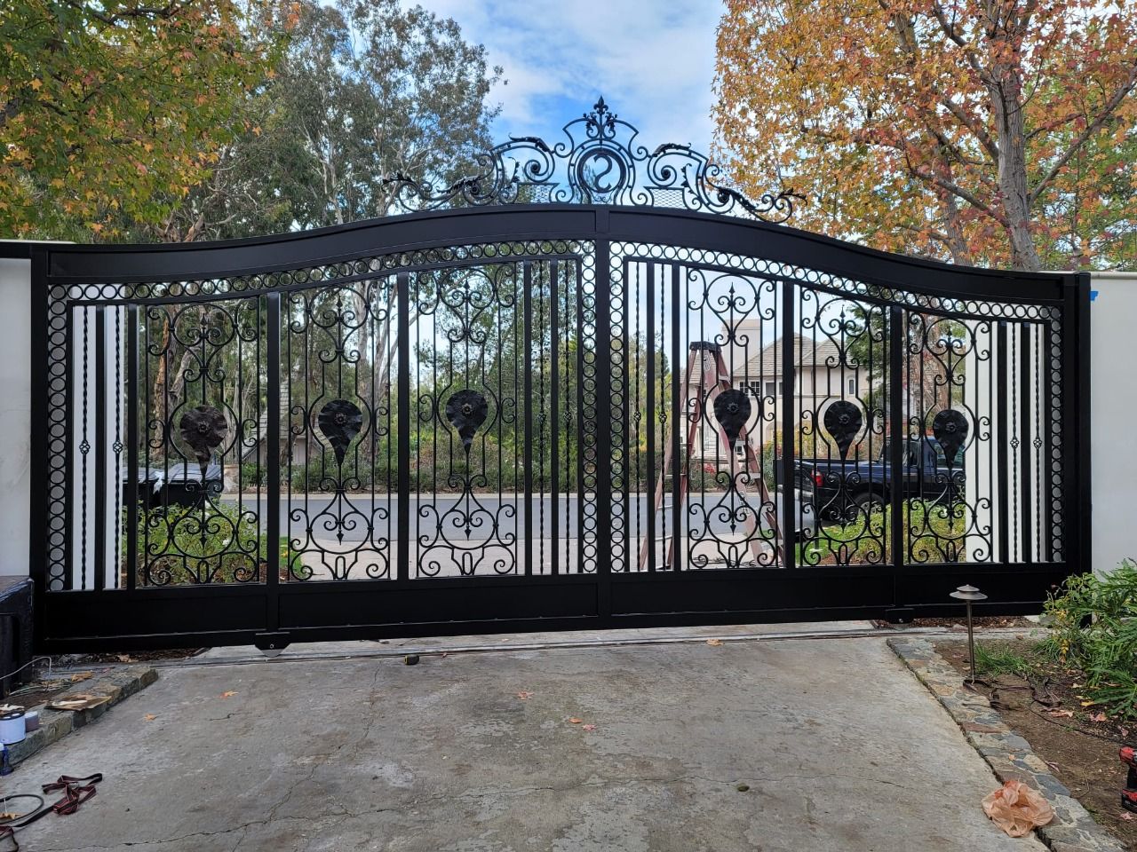 Ornate wrought iron driveway gate